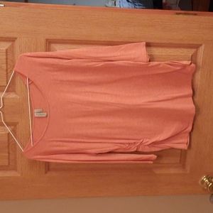 Orange and gray shirt.